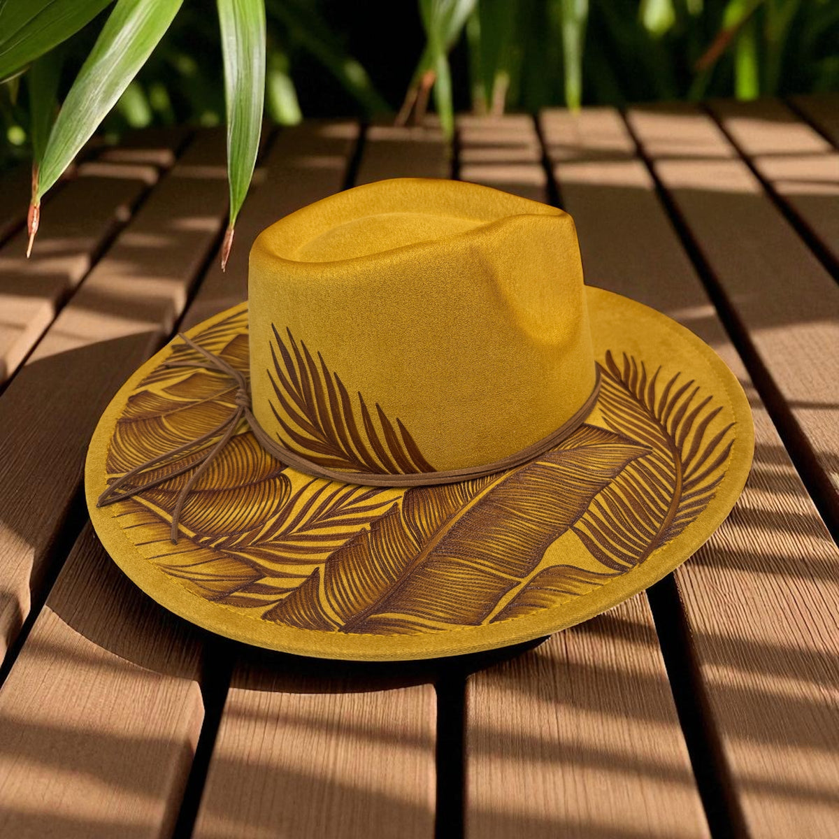 Mustard Piper fedora showing botanical artwork around the crown and brim