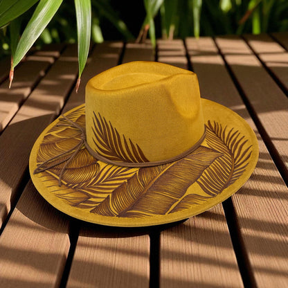 Mustard Piper fedora showing botanical artwork around the crown and brim