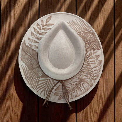 Overhead view of the ivory fedora showing the inner crown line and burned foliage