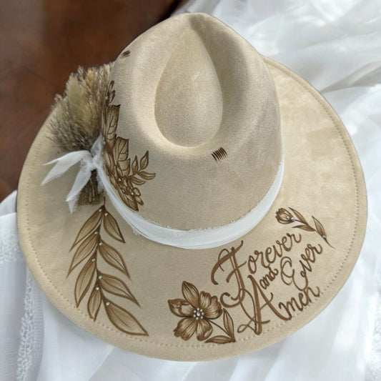 Overhead view of the Forever & Ever hat showing floral artwork and decorative lettering