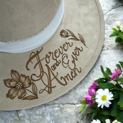 Close-up of the Forever you and me Amen lettering burned into the hat brim