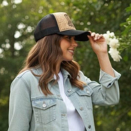 Model wearing the Boots cork trucker with a denim jacket and jeans