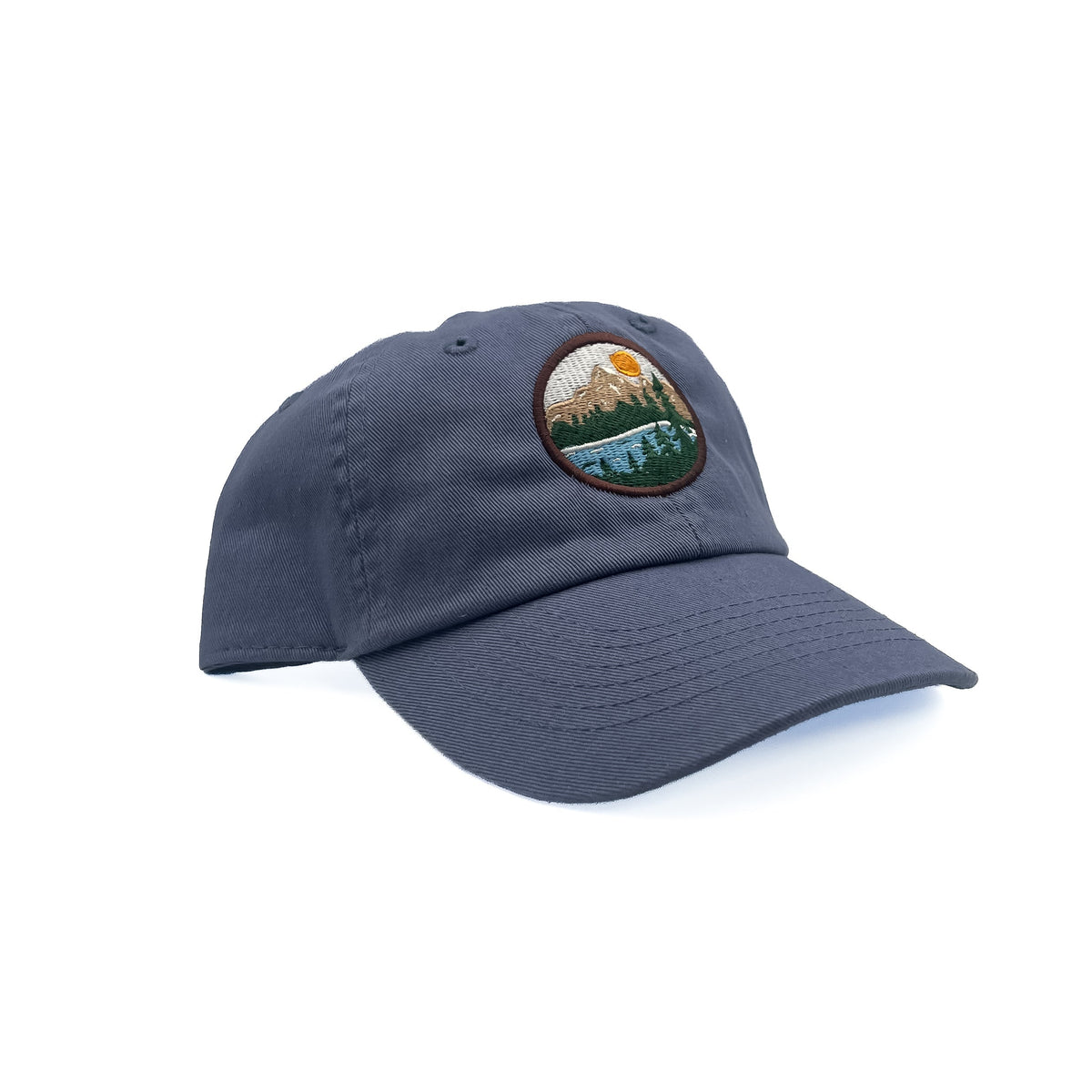 Angled view of Rey To Z Mountain Baseball Hat in Dusty Blue showing the curved bill and front design