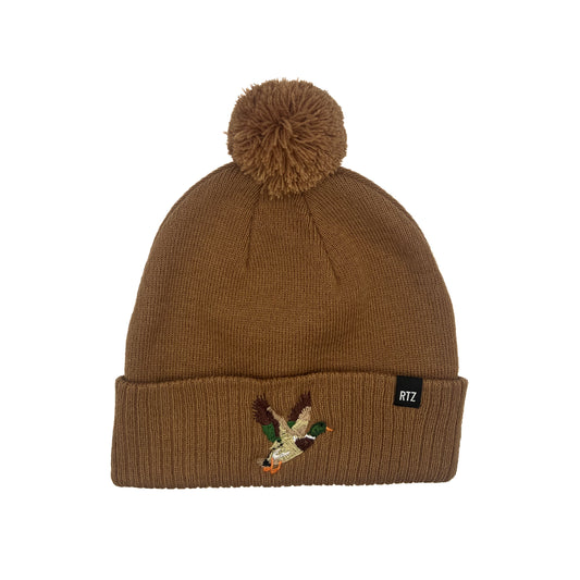 Rey To Z Mallard Pom Pom Hat in Latte showing mallard duck artwork on the cuff and a pom-pom top