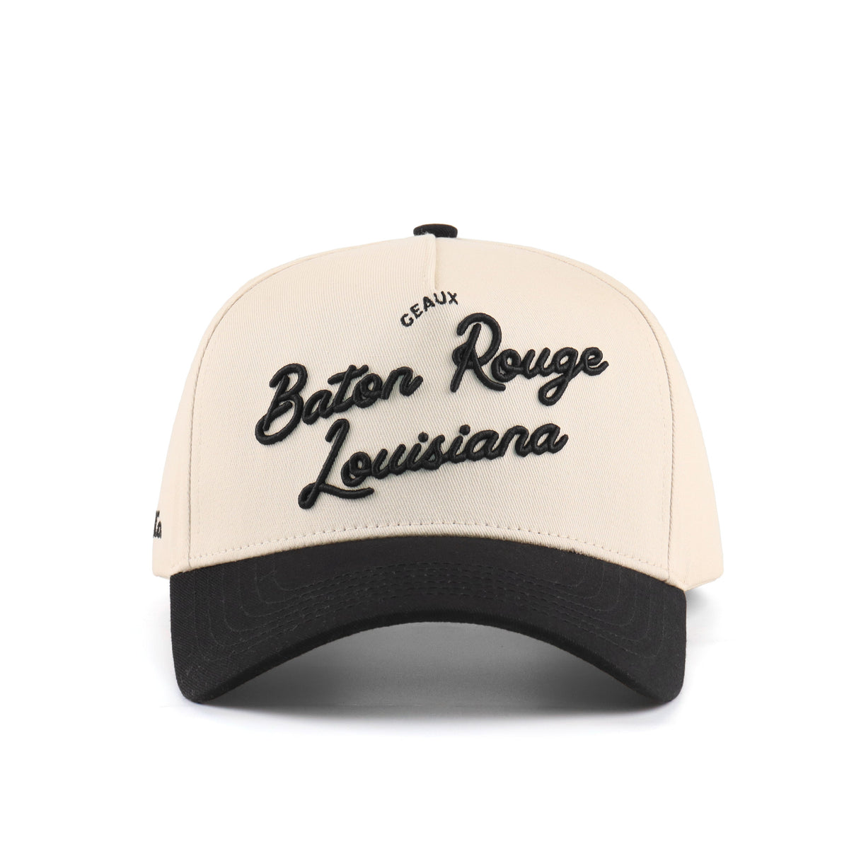 Front view of the Destination Hat Co. Baton Rouge script cap with black embroidery