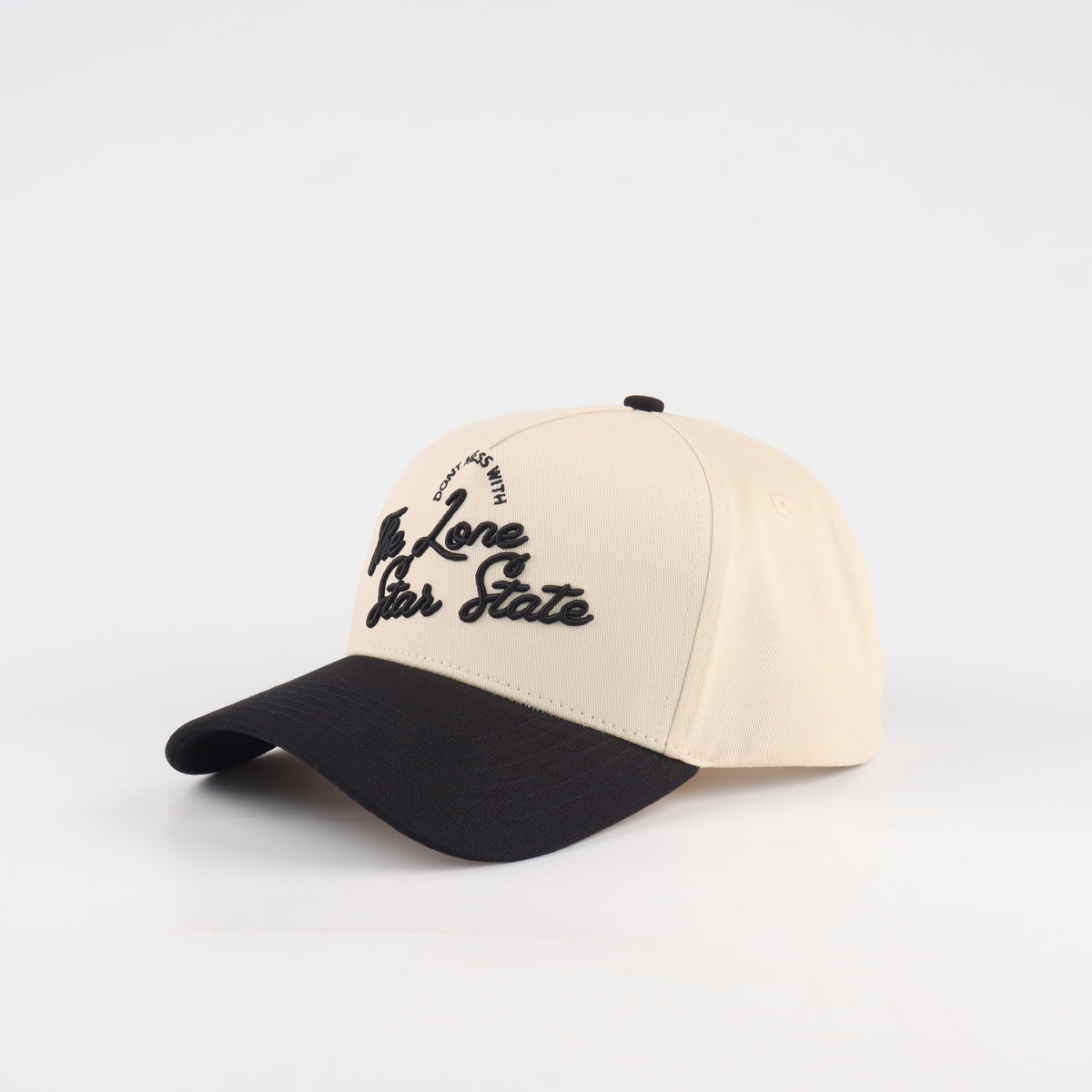 Opposite angled view of the Destination Hat Co. Lone Star script cap showing the black lettering