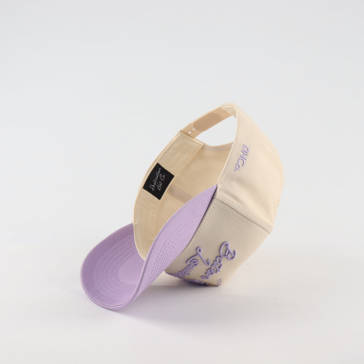 Interior view of the Destination Hat Co. Baton Rouge script cap showing the inner band and underside of the bill