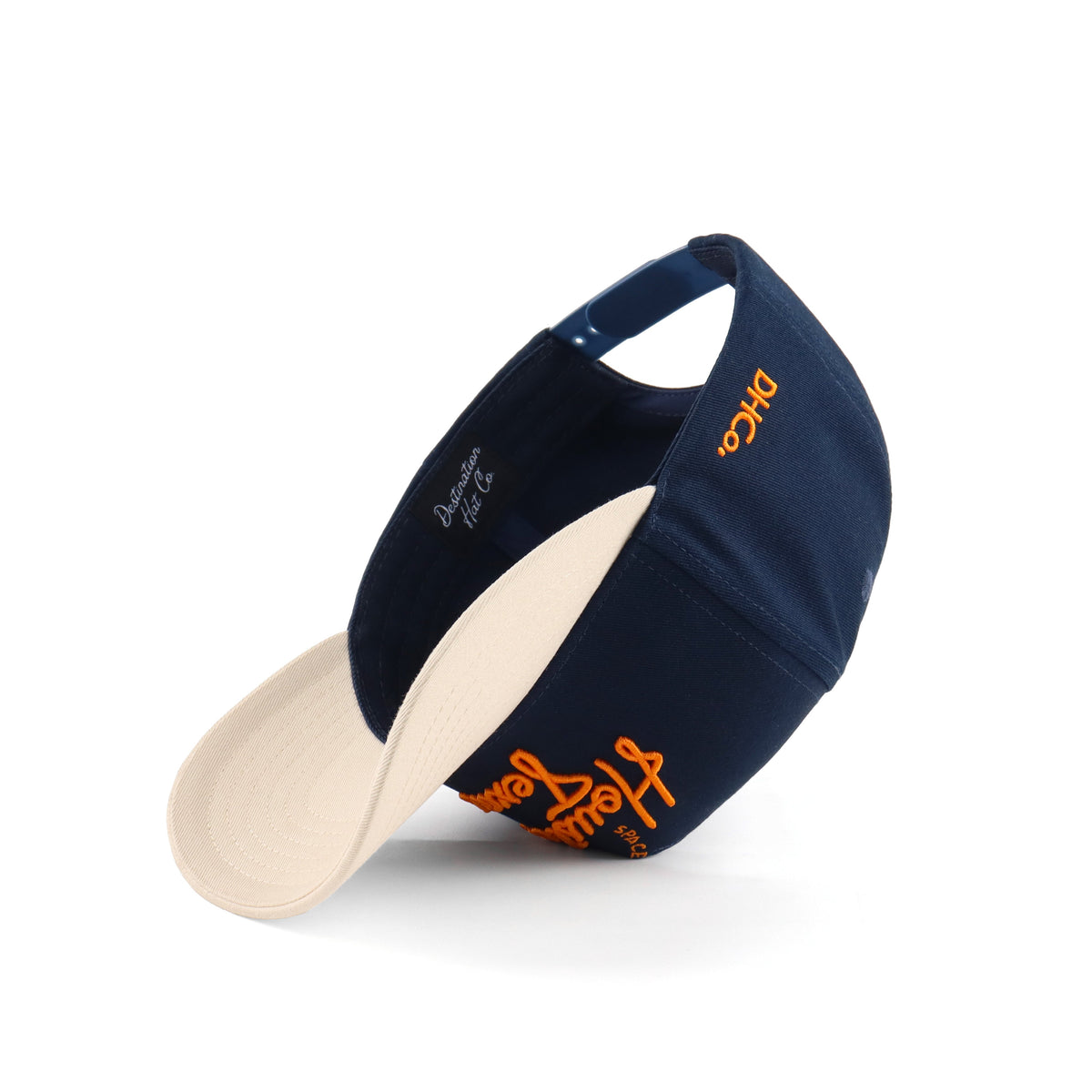 Interior view of the Destination Hat Co. Houston script cap showing the inner band and underside of the bill