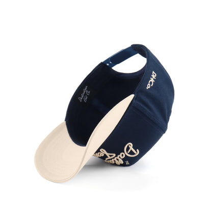 Interior view of the Destination Hat Co. Dallas script cap showing the inner band and underside of the bill