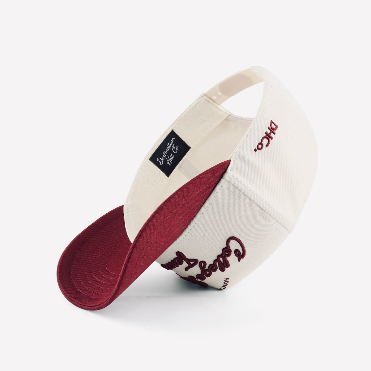 Interior and underside of the College Station Script Hat with maroon bill