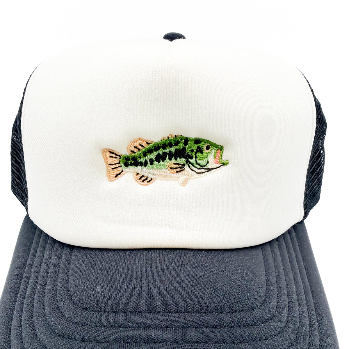 Close-up of the fish patch on the white front and black brim