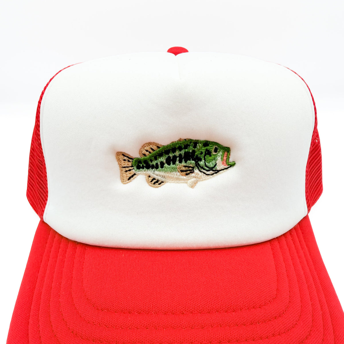 Close-up of the bass fish patch on the Red/White cap