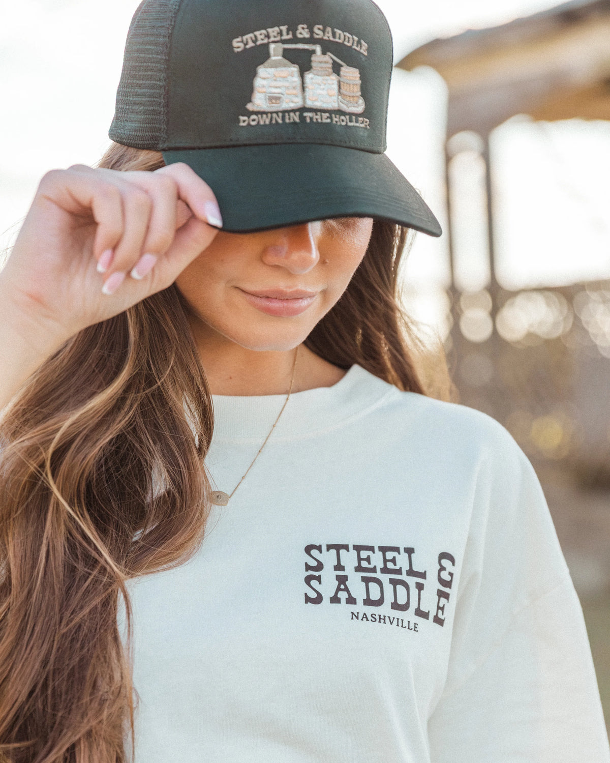 Close front view of the Stillhouse cap worn by a model
