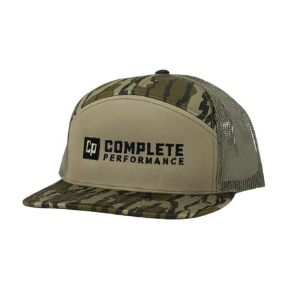 The Mad Hatter Company Complete Performance, camouflage crown and bill with a Complete Performance badge