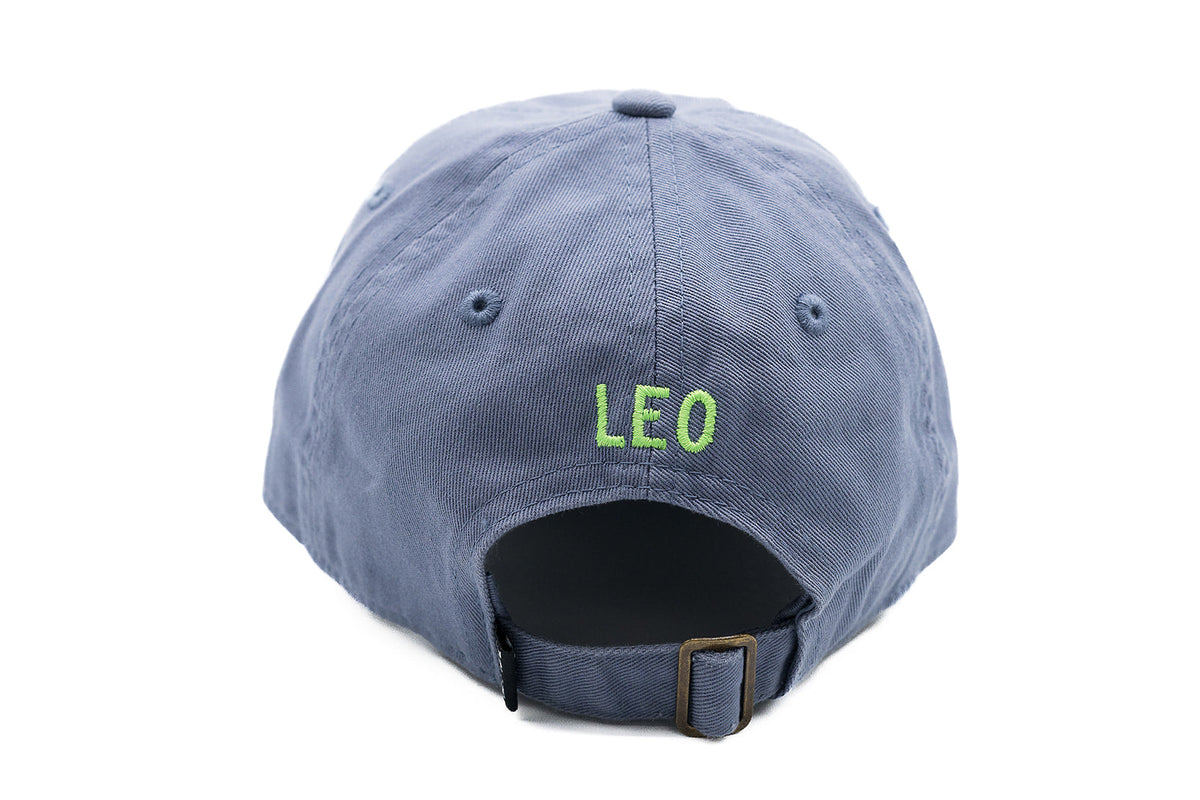 Rey To Z dusty Blue cap rear showing bright green LEO embroidery
