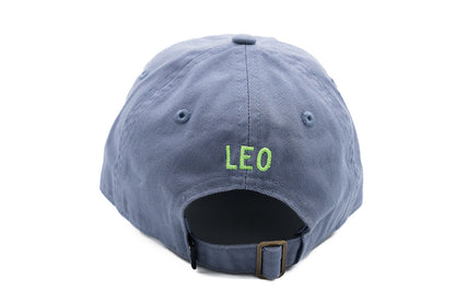 Rey To Z dusty Blue cap rear showing bright green LEO embroidery