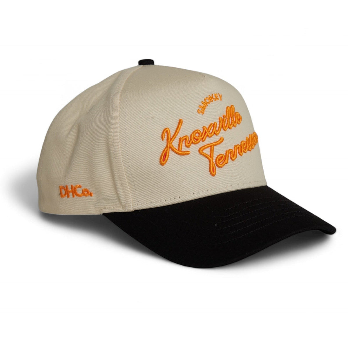 Destination Hat Co. Knoxville script cap with beige crown and black bill, angled view