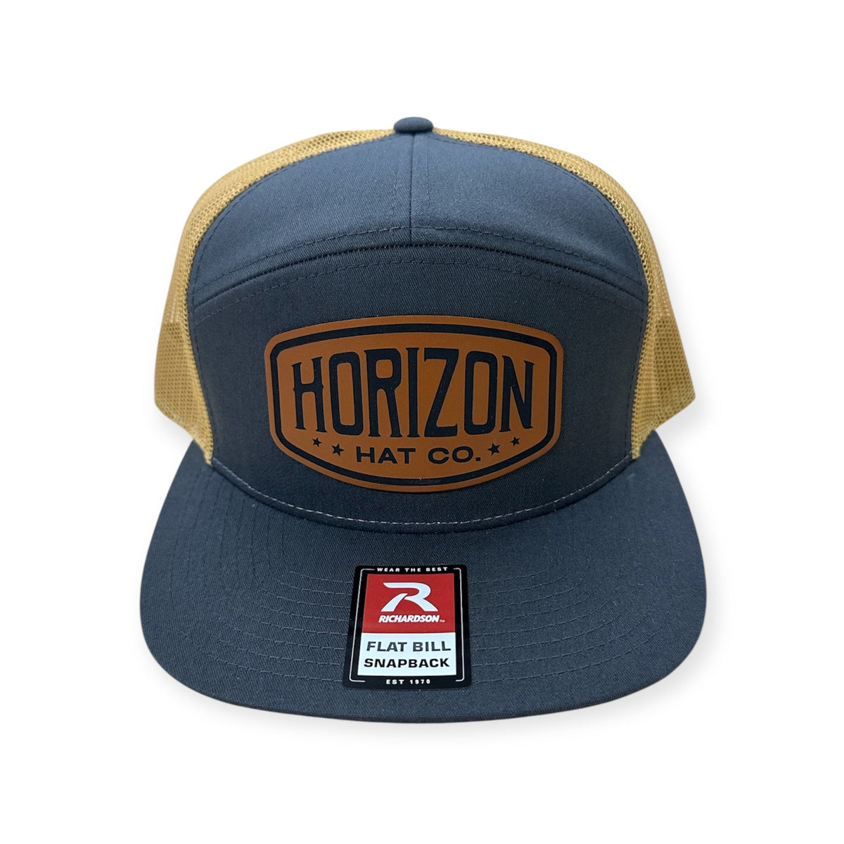 Charcoal and gold Horizon cap with a tan logo patch