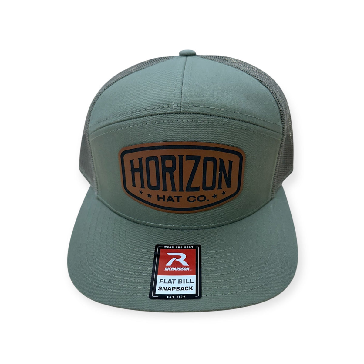 Loden Horizon flat-bill cap with a rawhide-colored patch