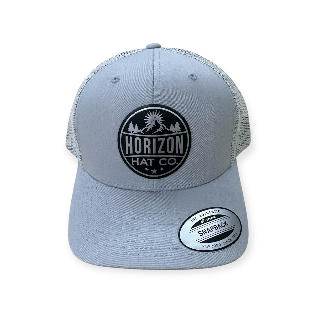 Silver Horizon cap with a black-to-silver logo patch