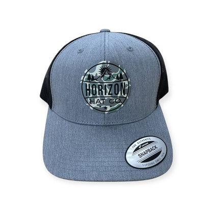 Heather gray and black Horizon cap with a Low Tide logo patch