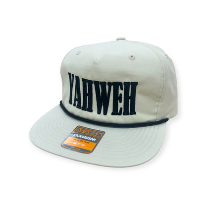 Angled view of Horizon Hat Co. YAHWEH embroidered Richardson 256 rope cap in White/Black