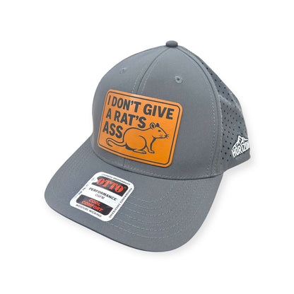 Angled view of I Don't Give a Rat's Ass patch hat by Horizon Hat Co. in gray showing the bill and side panels