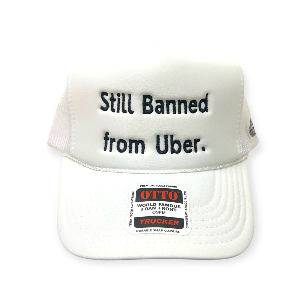 Front view of Still Banned From Uber embroidered cap by Horizon Hat Co. in white/black lettering showing still banned from uber statement embroidery