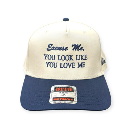 Front view of Excuse Me, You Look Like You Love Me embroidered cap by Horizon Hat Co. in natural/navy showing excuse me, you look like you love me front embroidery