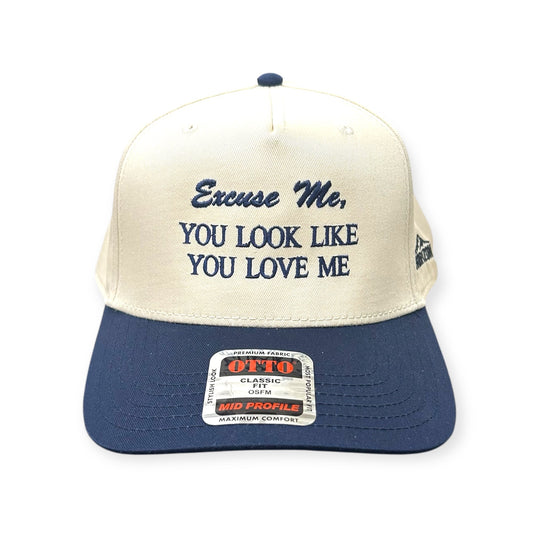 Front view of Excuse Me, You Look Like You Love Me embroidered cap by Horizon Hat Co. in natural/navy showing excuse me, you look like you love me front embroidery