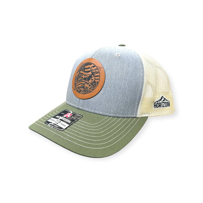 Angled view of Hunting & Fishing patch hat by Horizon Hat Co. in heather gray/birch/army olive showing the curved bill and side panels