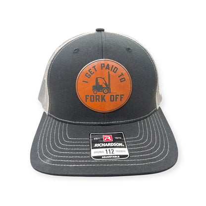 Front view of I Get Paid to Fork Off patch hat by Horizon Hat Co. in heather black/charcoal showing forklift illustration with workplace-humor lettering
