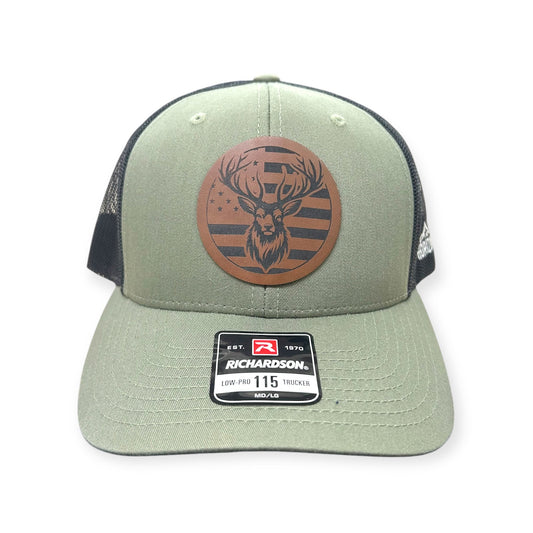 Front view of Deer / American Flag patch hat by Horizon Hat Co. in loden/black showing leather patch combining a deer and the american flag