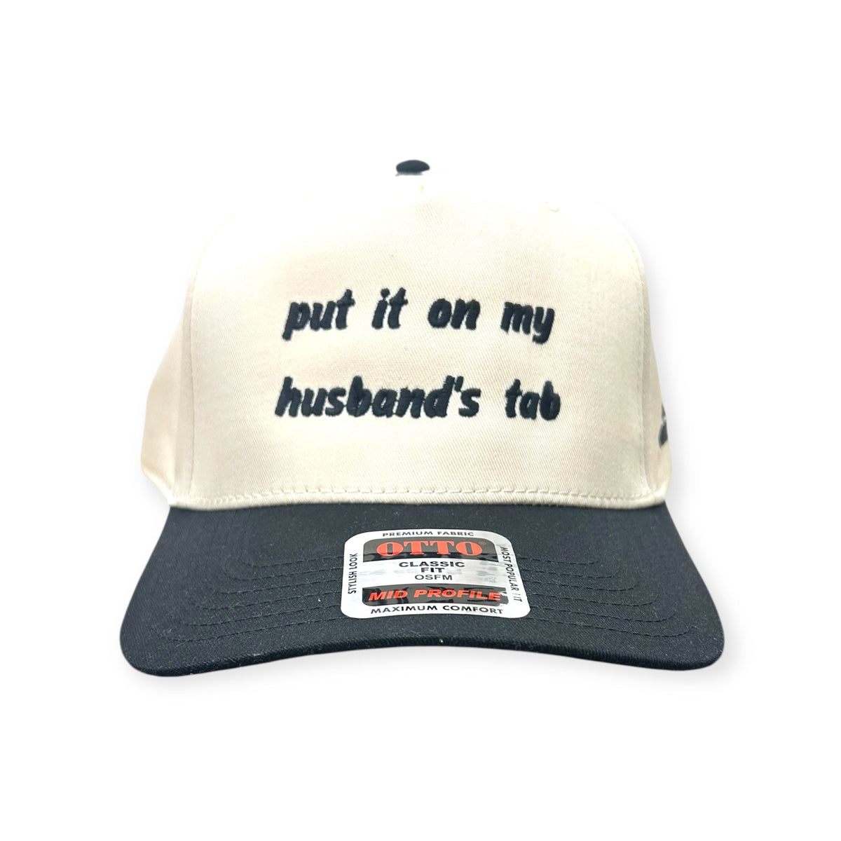 Front view of Put It on My Husband's Tab cap by Horizon Hat Co. in Natural/Black showing put it on my husband's tab front embroidery