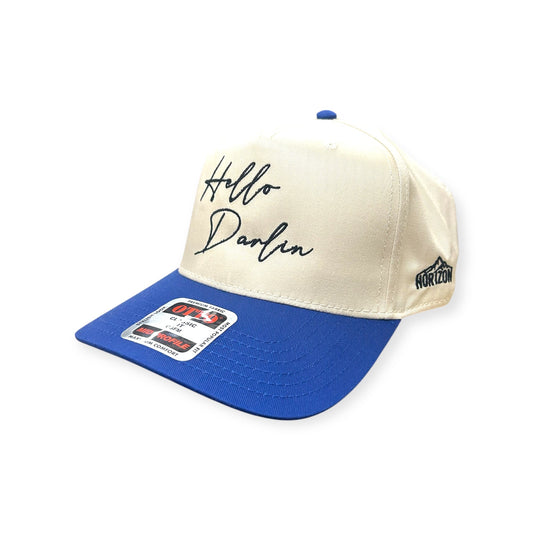 Angled view of Hello Darlin' cap by Horizon Hat Co. in Natural/Blue showing hello darlin' front embroidery