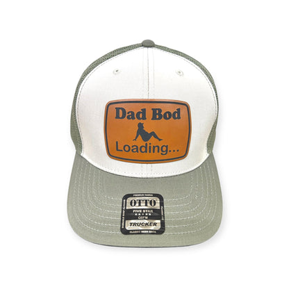 Front view of Dad Bod Loading patch hat by Horizon Hat Co. in white/green showing dad bod loading patch with a progress-bar graphic