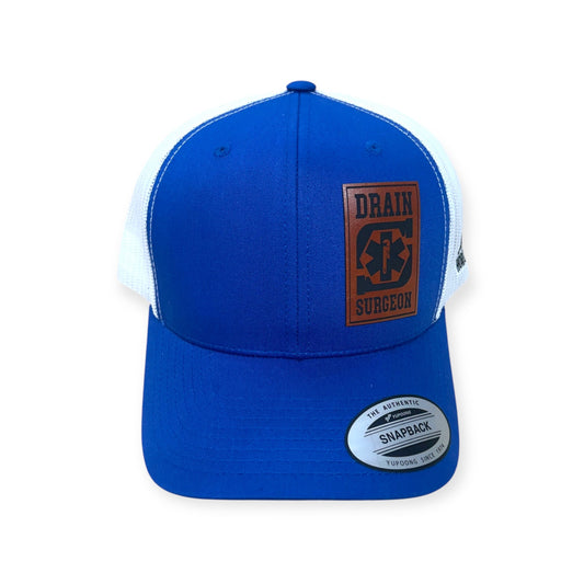 Front view of Drain Surgeon patch hat by Horizon Hat Co. in royal/white showing plumber-themed drain surgeon patch