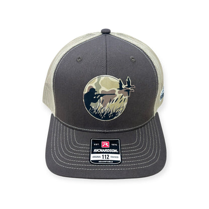 Front view of Duck Hunt patch hat by Horizon Hat Co. in brown/khaki showing camouflage patch depicting a duck hunter taking aim