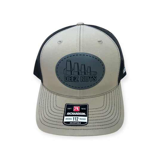 Front view of Deez Nuts patch hat by Horizon Hat Co. in khaki/brown showing wire-nut illustration and electrician-humor lettering