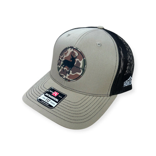 Angled view of Deer Scope patch hat by Horizon Hat Co. in khaki/coffee showing the bill and side panels