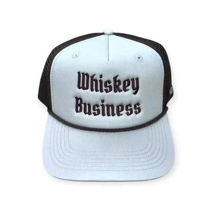 Front view of Whiskey Business embroidered cap by Horizon Hat Co. in sand/chocolate showing whiskey business front embroidery
