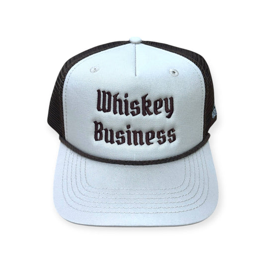 Front view of Whiskey Business embroidered cap by Horizon Hat Co. in sand/chocolate showing whiskey business front embroidery