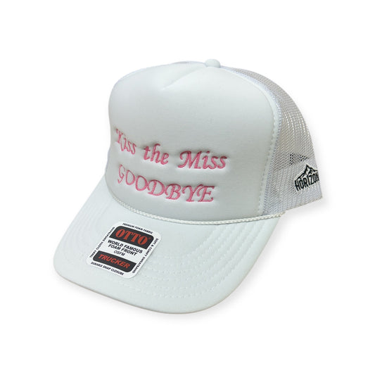 Angled view of Kiss the Miss Goodbye embroidered cap by Horizon Hat Co. in white/pink lettering showing the bill and side panels