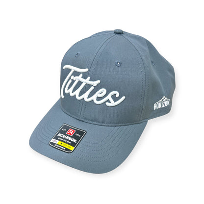Angled view of the charcoal embroidered golf cap