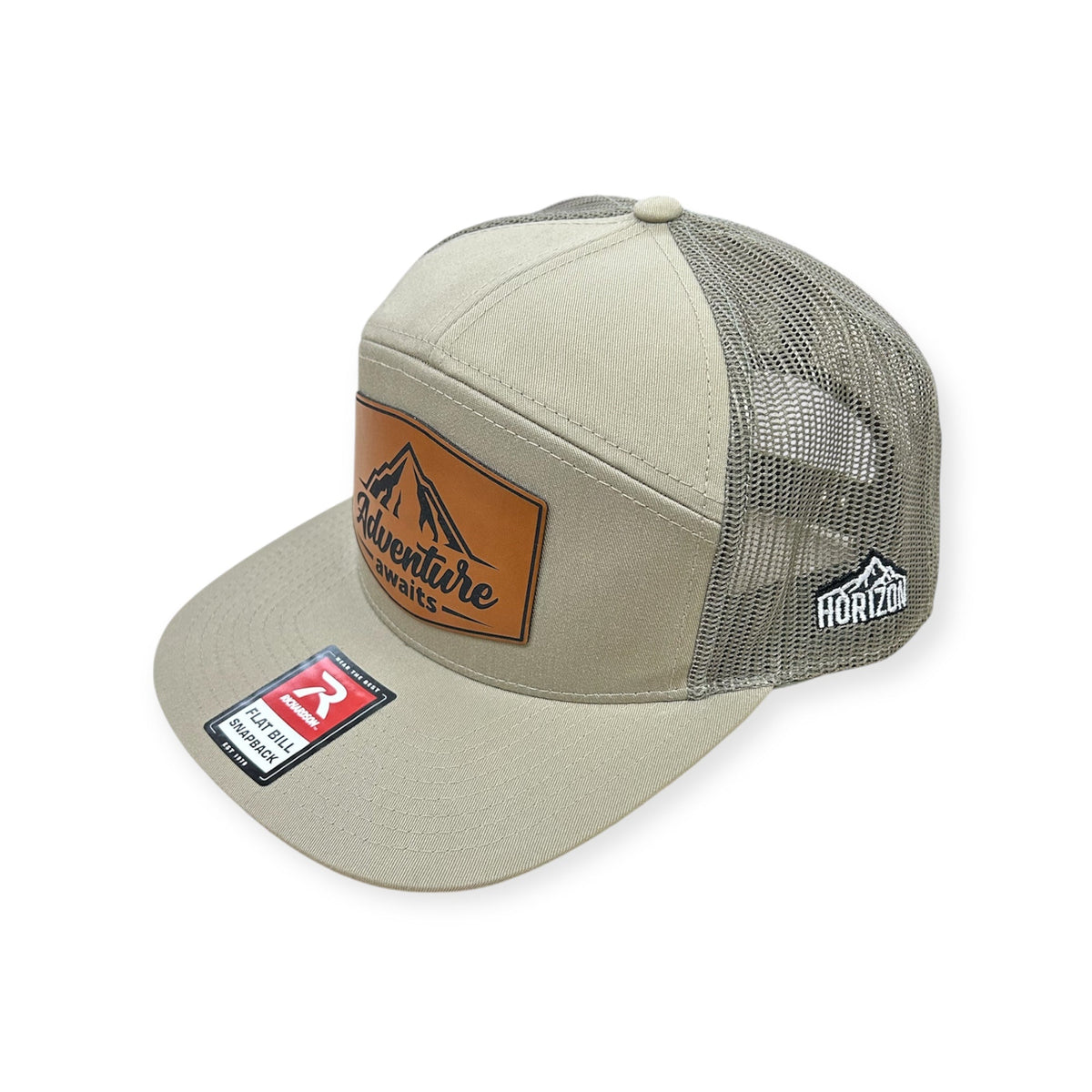 Angled view of Adventure Awaits patch hat by Horizon Hat Co. in pale khaki/loden green showing the bill and side panels