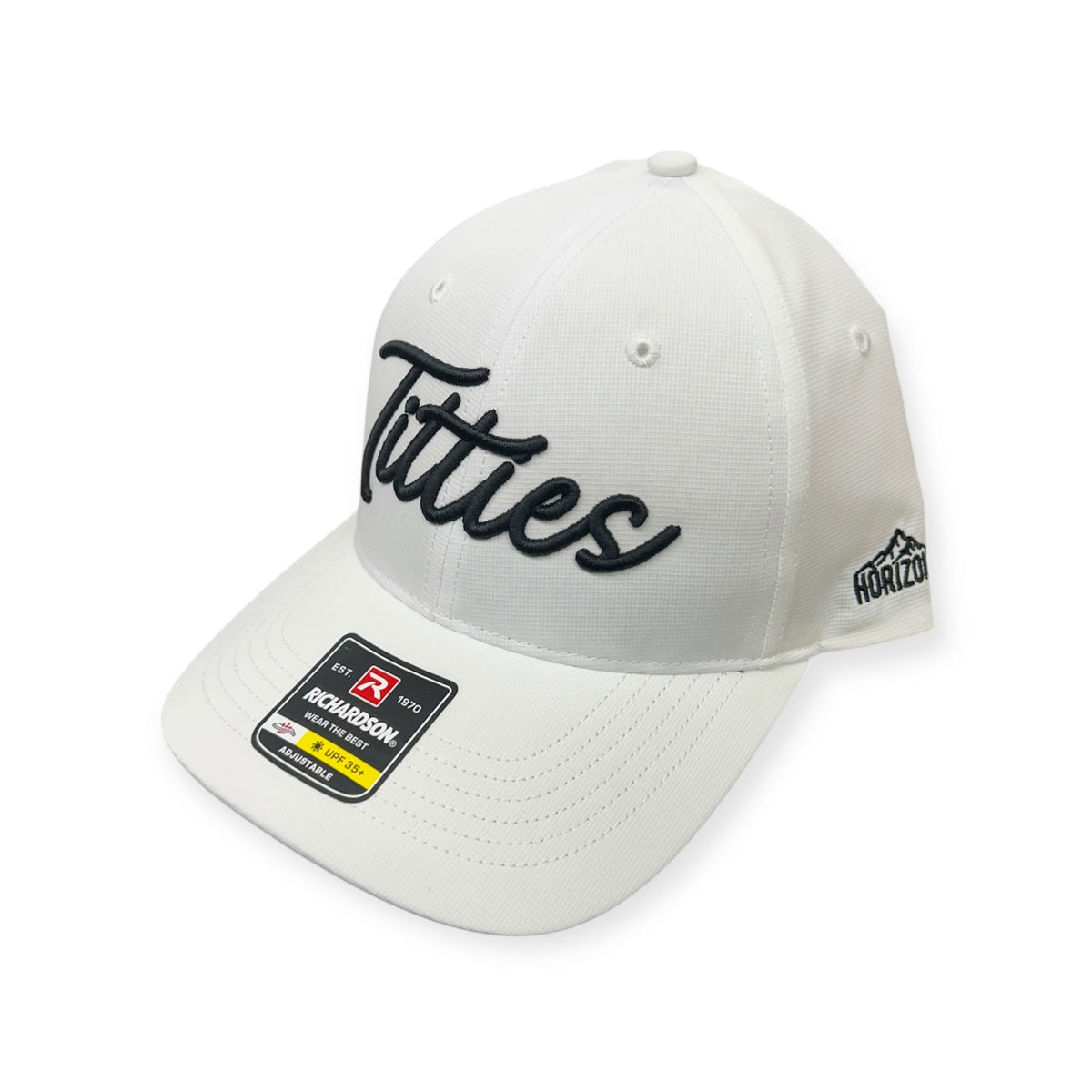 Angled view of the white embroidered performance cap
