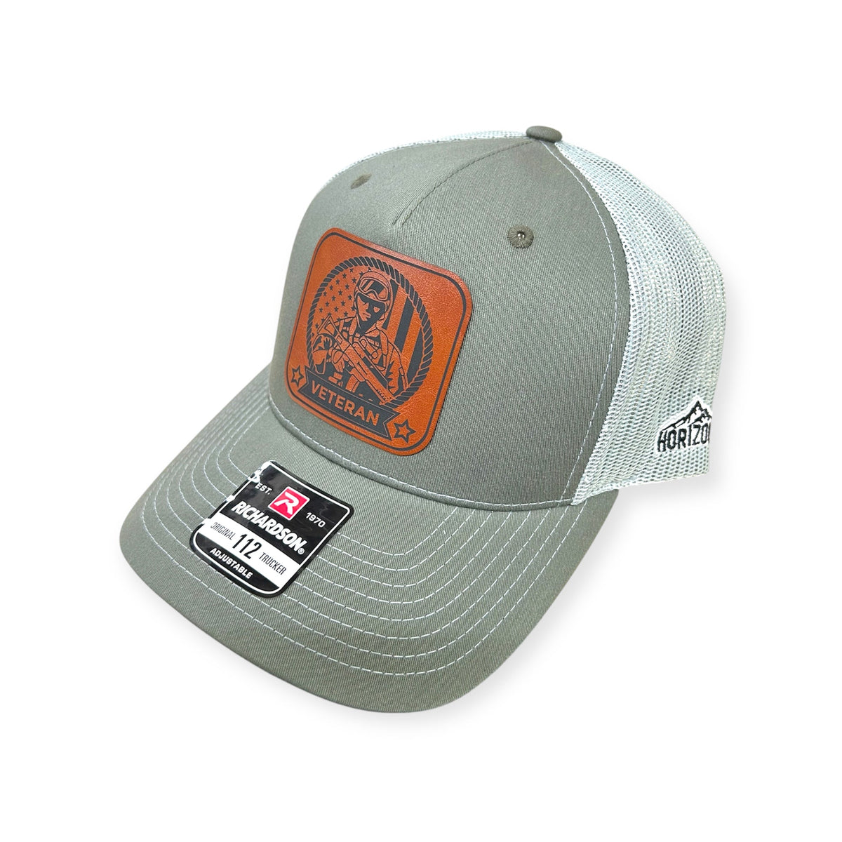 Angled view of Veteran #2 patch hat by Horizon Hat Co. in beetle/quarry showing the curved bill and side panels