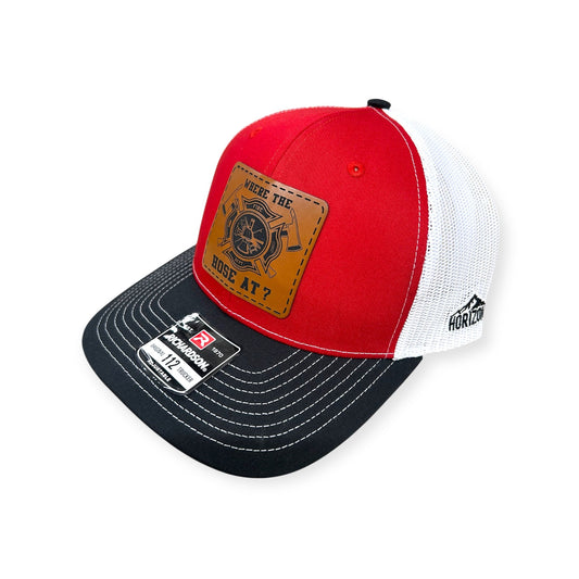 Angled view of Where The Hose At? patch hat by Horizon Hat Co. in red/white/black showing the curved bill and side panels