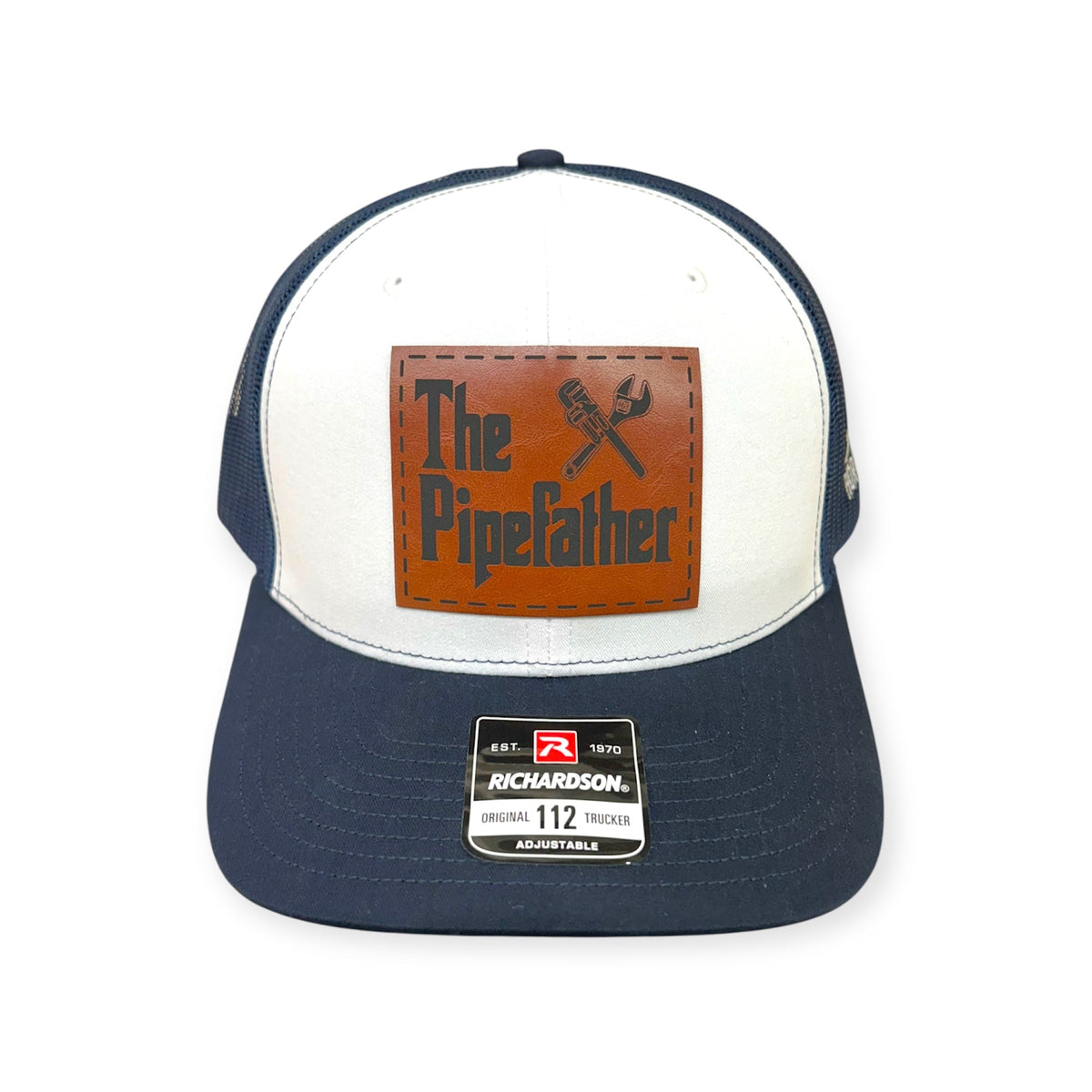 Front view of The Pipefather patch hat by Horizon Hat Co. in navy/white/navy showing plumbing-themed pipefather patch