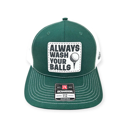 Front view of Always Wash Your Balls patch hat by Horizon Hat Co. in dark green/white showing golf ball graphic with a golf-humor slogan